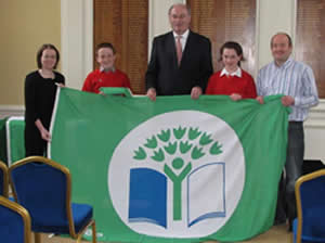 Phil Hogan TD presenting St Canices Co-Ed Primary School their 3rd Green Flag at the National Awards Ceremony